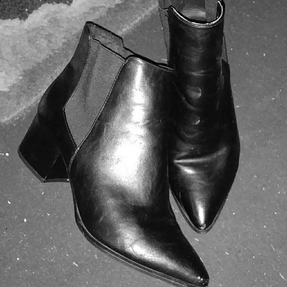 Black leather with elastic boots.